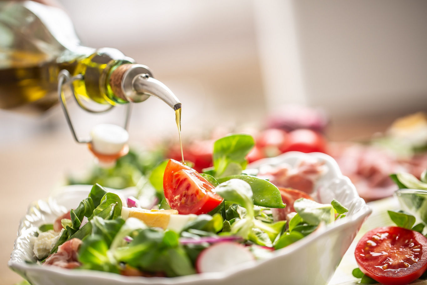 Oil Being Poured Over Salad | Blog | Greystar